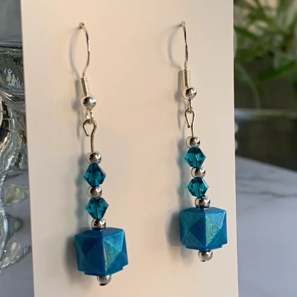 Small multifaceted shimmery teal cube earrings